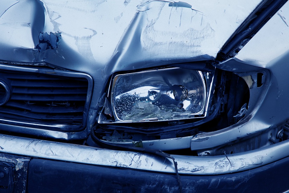 Car with damaged headlight