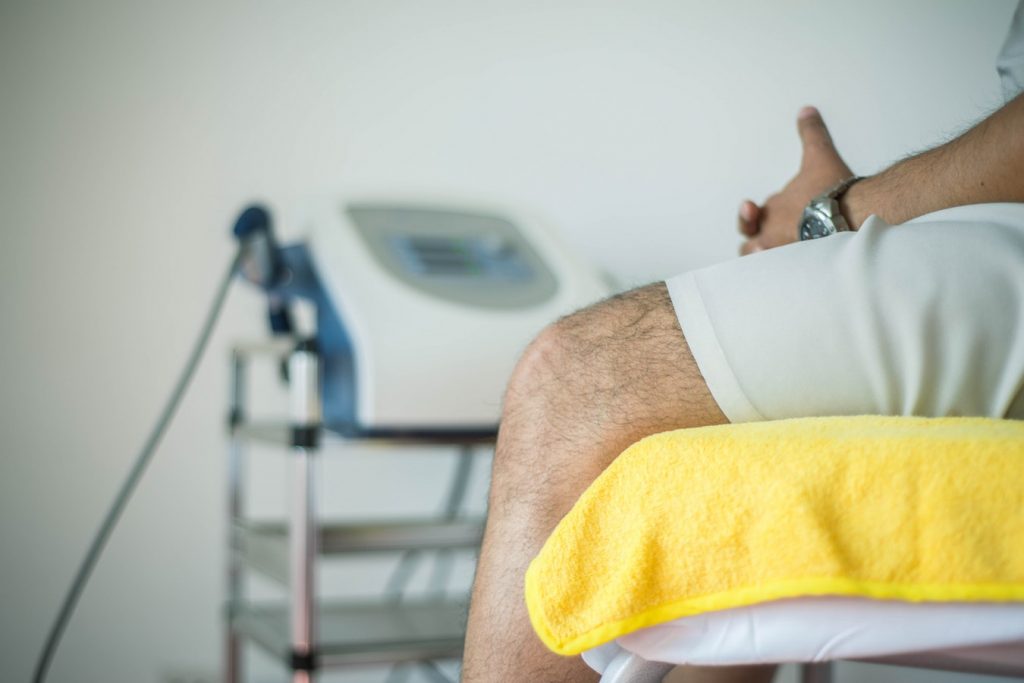 Man sat on hospital bed